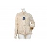 Extra light women's jacket with drawstring waist and gold pressure buttons.