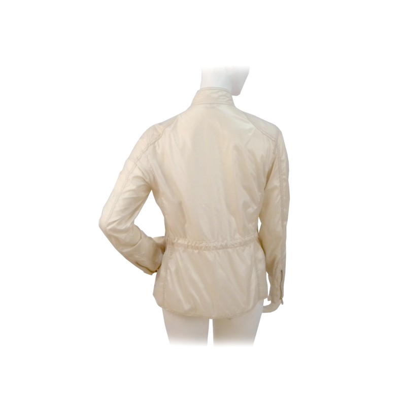 Extra light women's jacket with drawstring waist and gold pressure buttons.