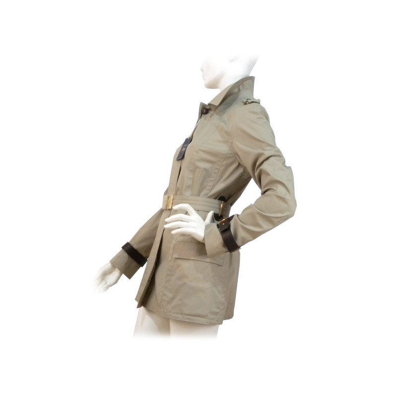 Women's long jacket with 2 waisted belt pockets with gold buckle and sleeves finishes with leather straps.