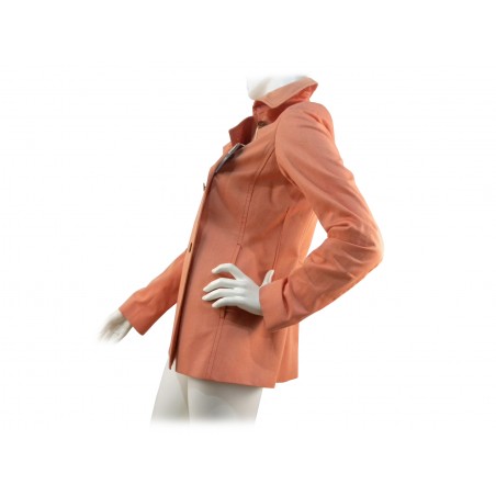 Double breasted women's jacket with back belt.