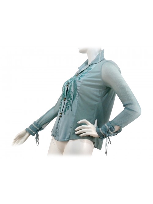 Woman shirt with floral embroidery on transparent contrast fabric