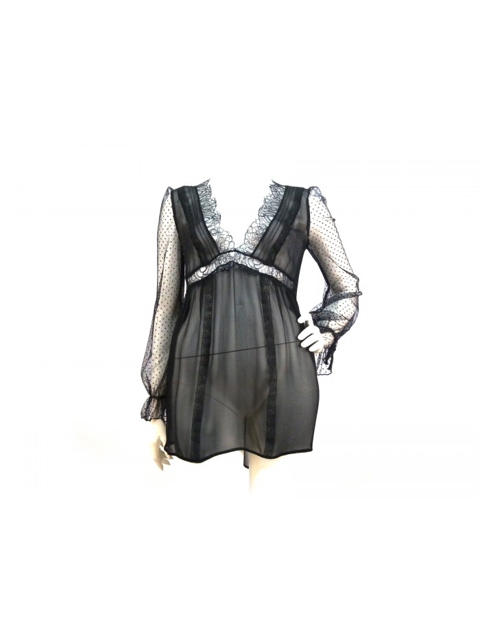 Woman's transparent, low-cut shirt, flared with chest-edge lace. Woman's transparent, low-cut shirt, flared with chest-edge lace.