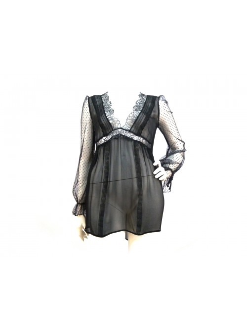 Woman's transparent, low-cut shirt, flared with chest-edge lace. Woman's transparent, low-cut shirt, flared with chest-edge lace.