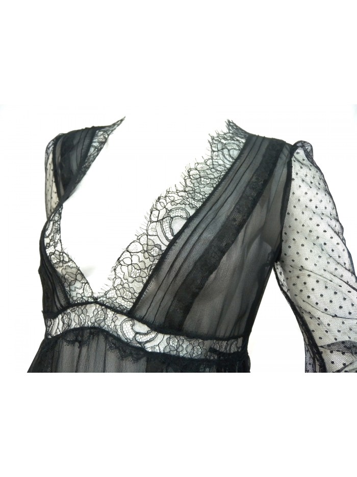 Woman's transparent, low-cut shirt, flared with chest-edge lace.