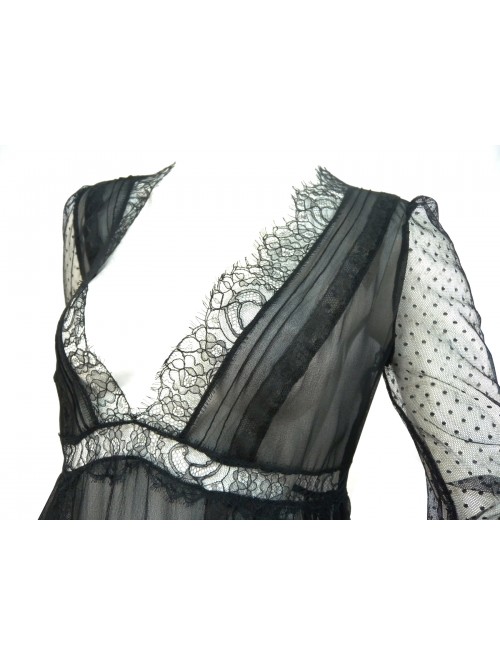 Woman's transparent, low-cut shirt, flared with chest-edge lace.