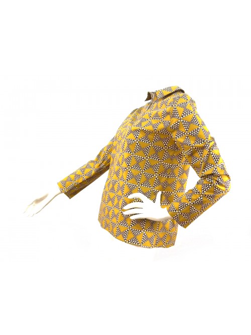 Woman shirt with modular geometric designs, collar and opening.
