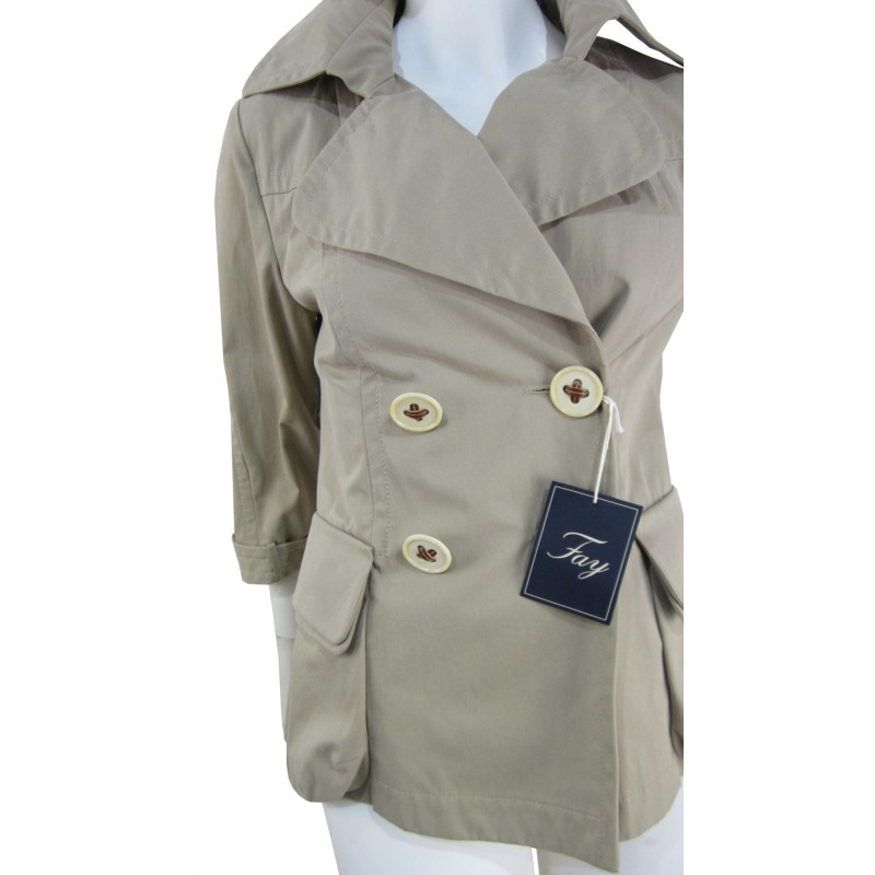 Short double breasted woman jacket 2 overlapping pockets with 3/4 sleeve wide buttons.