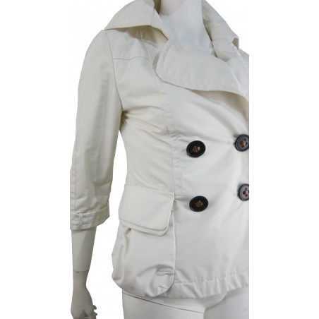 Double breasted woman jacket 2 overlapping pockets with wide buttons and 3/4 sleeves.