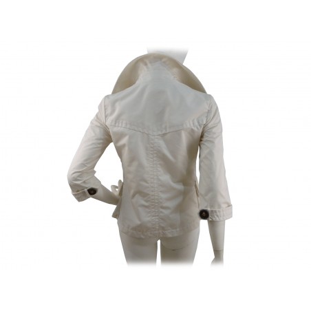 Double breasted woman jacket 2 overlapping pockets with wide buttons and 3/4 sleeves.