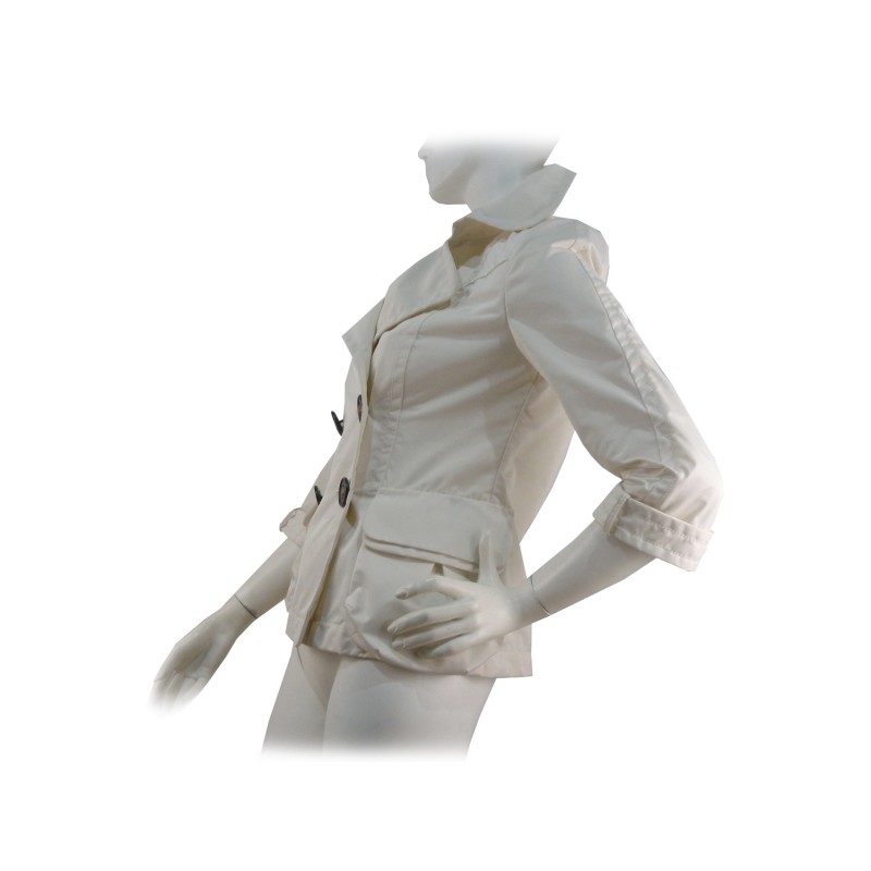 Double breasted woman jacket 2 overlapping pockets with wide buttons and 3/4 sleeves.