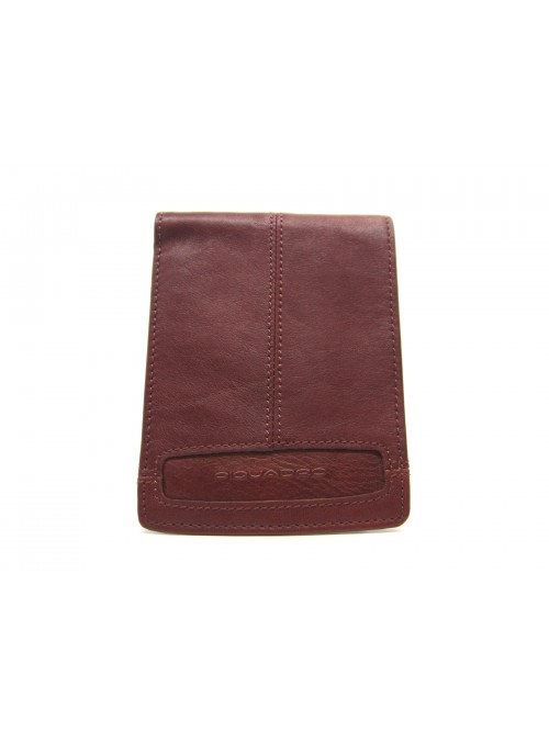 Man purse lined in contrast with credit card compartments