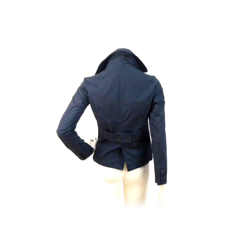 Short double breasted jacket with rear martingale.