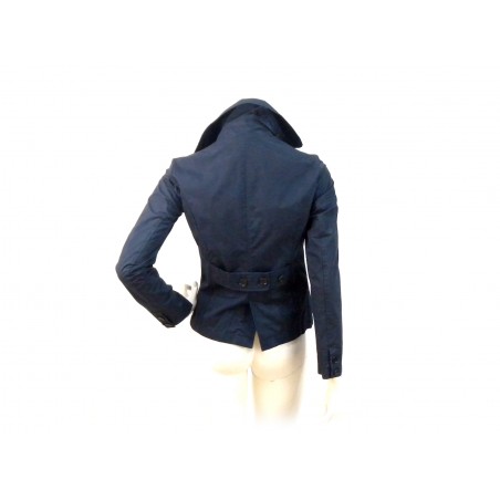 Short double breasted jacket with rear martingale.