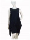 Elegant woman dress in pleated, with upper part in alcantara