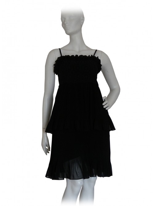 Woman dress with shoulder strap and bodice with pleated flounce. Woman dress with shoulder strap and bodice with pleated flounce.