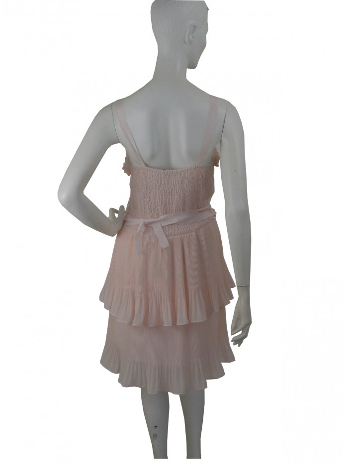 Woman dress with shoulder strap and bodice with pleated flounce