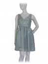 Elegant woman dress, round neckline with sequin inserts on the same color