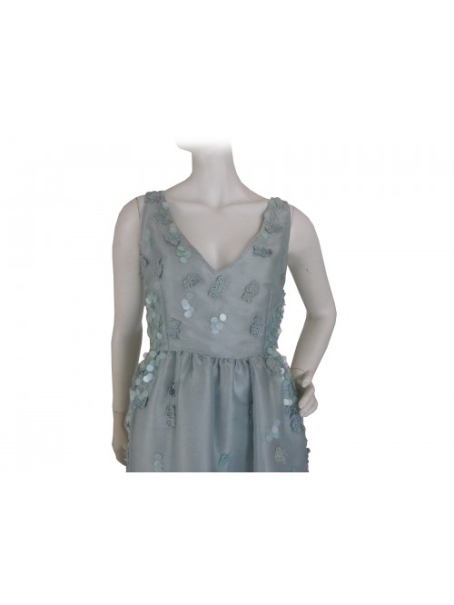 Elegant woman dress, round neckline with sequin inserts on the same color