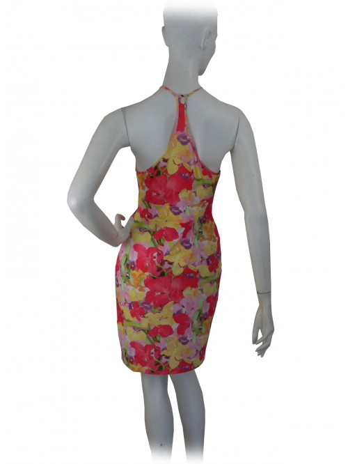 Woman dress with crossed braces, floral pattern with inserts