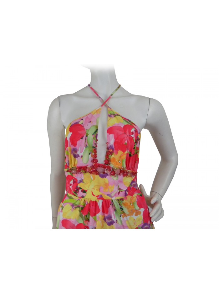 Woman dress with crossed braces, floral pattern with inserts