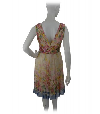 Sleeveless woman dress with creped bodice and ruffled skirt 2