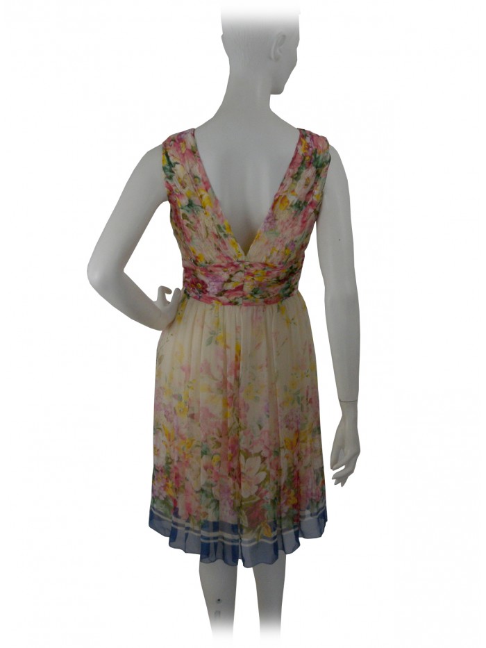 Sleeveless woman dress with creped bodice and ruffled skirt