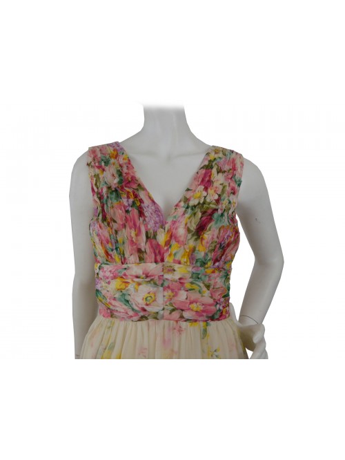 Sleeveless woman dress with creped bodice and ruffled skirt