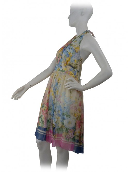 Sleeveless woman dress with creped bodice and gathered skirt