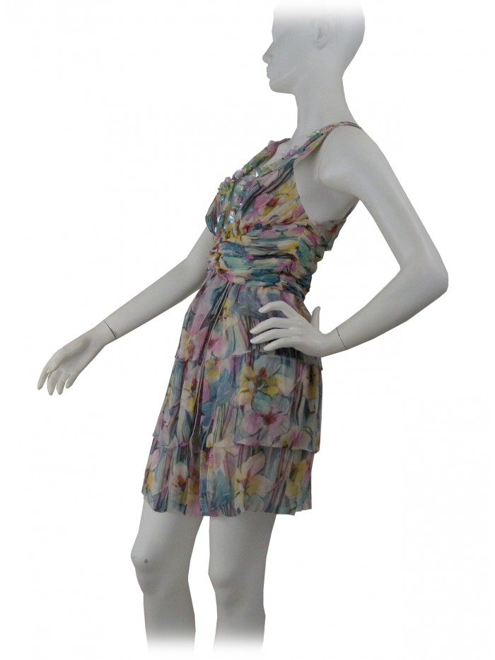 Sleeveless woman dress with plunging neckline, pleated bodice,