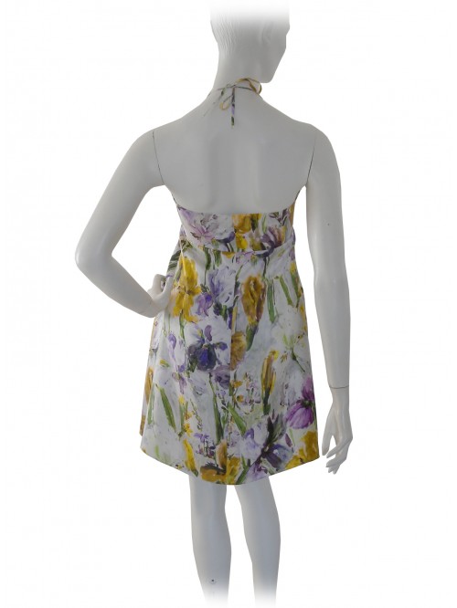 Woman dress with floral patterned pleats inserts stones and straps