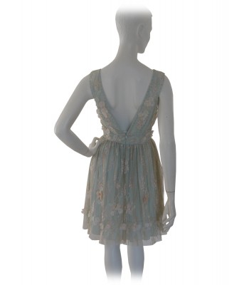 Elegant woman dress, lace with flowers applied ecru on green 2