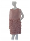 Elegant woman dress with sheer bodice and flounced skirt.