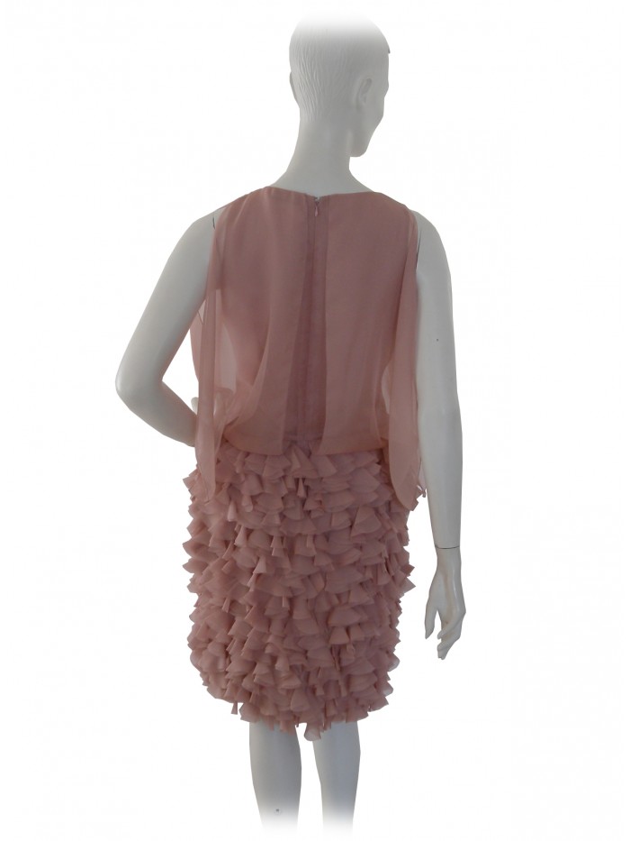 Elegant woman dress with sheer bodice and flounced skirt.