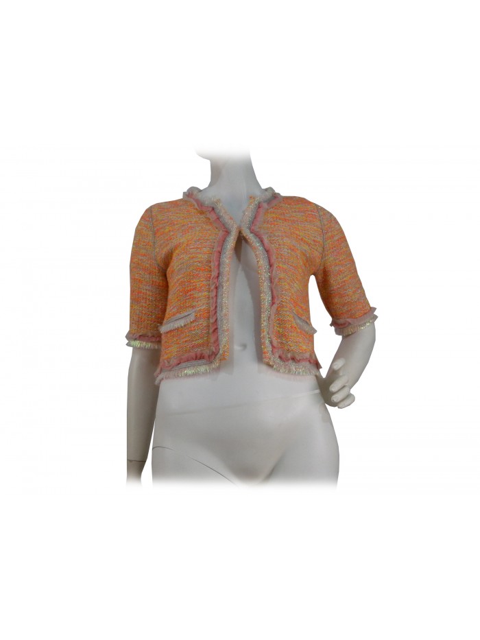 Short unlined women's jacket, 3/4 sleeve, fringed on silver edges Short unlined women's jacket, 3/4 sleeve, fringed on silver edges