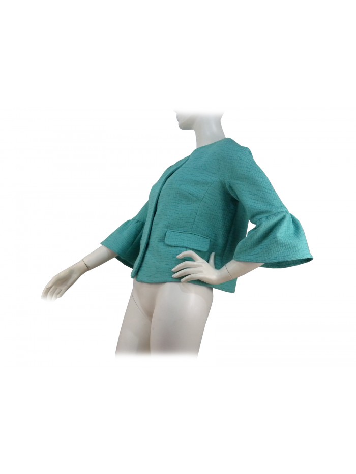 Short lined woman jacket, fabric with mosaic decorations in relief on color