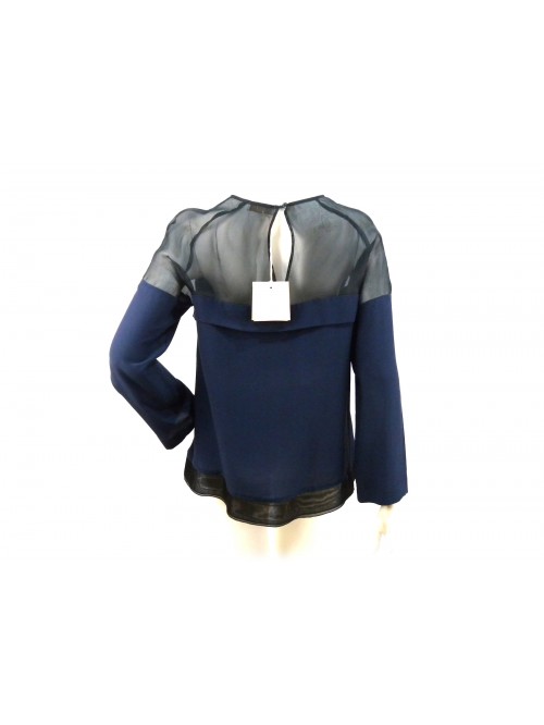 Camicia donna organza e seta con parte superiore trasparente.