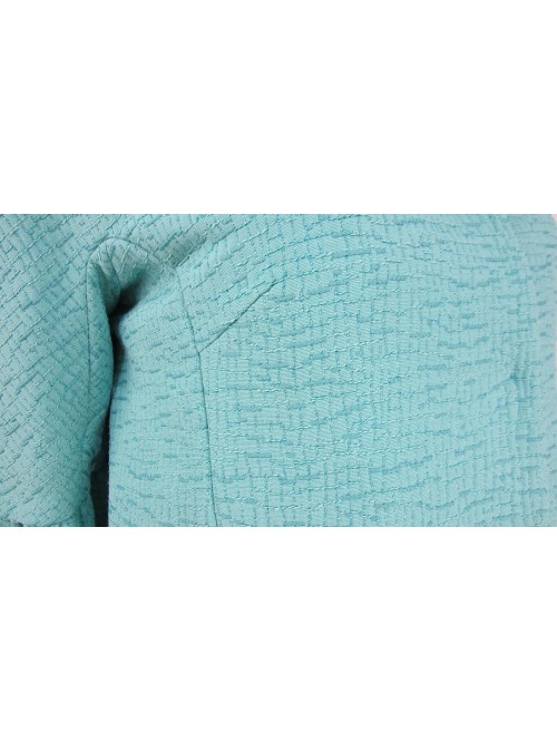 Short lined woman jacket, fabric with mosaic decorations in relief on color