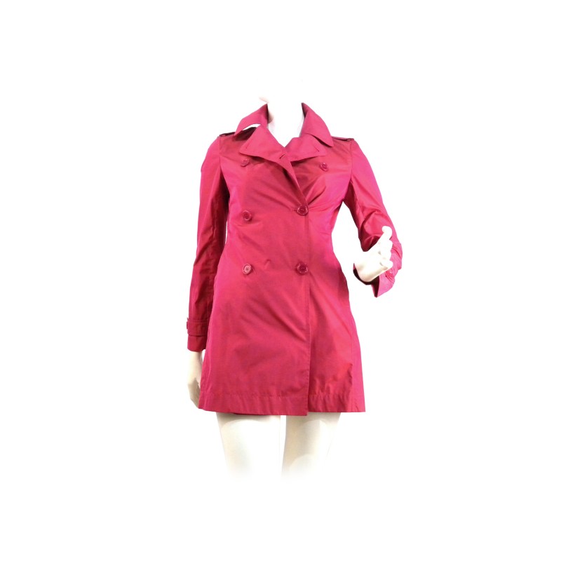 Waterproof double-breasted women's jacket with matching buttons. Waterproof double-breasted women's jacket with matching buttons.