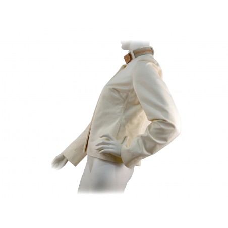 Slim short women's jacket with high collar and contrasting leather belt.