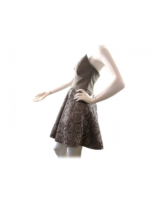 Mod. Celin woman dress, low-cut strapless model, smooth upper part and flared underside with decorative lace pattern.