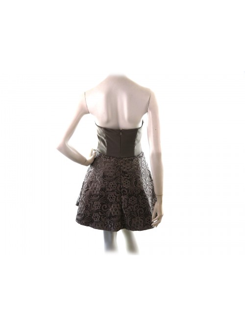 Mod. Celin woman dress, low-cut strapless model, smooth upper part and flared underside with decorative lace pattern.